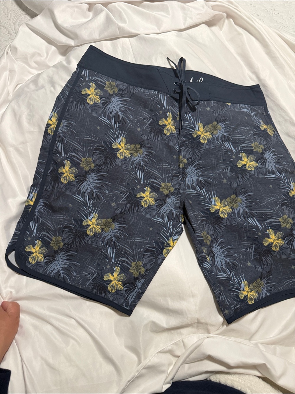 Travis Mathew Navy Floral Swim Board Shorts with Yellow Accents - Picture 1 of 7